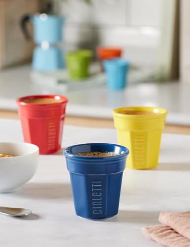 Set of six Bialetti ceramic espresso cups in vibrant orange and multi-colored designs, perfect for serving espresso.