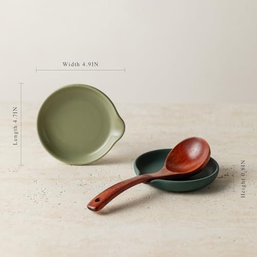 Set of four Vrutaoci ceramic spoon rests for holding spoons, spatulas, whisks, and ladles on stove tops.