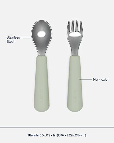 Lalo Big Bites silicone kids dinnerware set with five sage-colored plates and utensils for toddlers and young children.