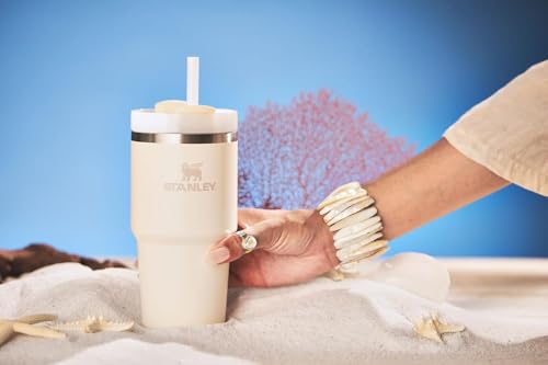 STANLEY Quencher H2.0 Tumbler with Straw 20 oz | Flowstate 3-Position Lid | Cup Holder Compatible for Travel | Insulated Stainless Steel Cup | BPA-Free | Cream