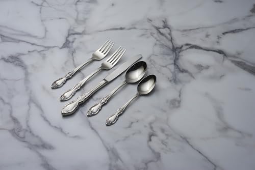 Set of four Oneida Louisiana teaspoons in silverware flatware set for four, featuring polished stainless steel teaspoons.