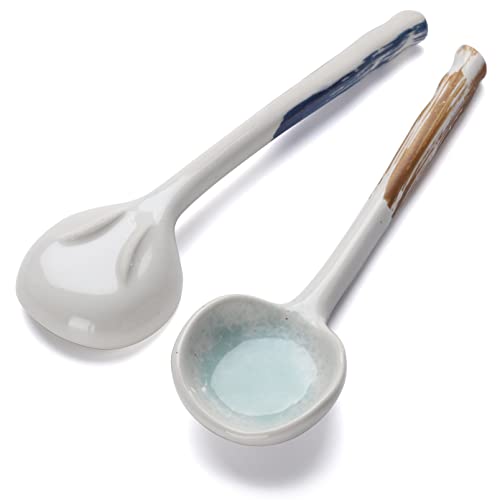 Set of 4 Evannt ceramic Japanese ramen soup spoons with traditional Asian style, featuring sleek white ceramic design.