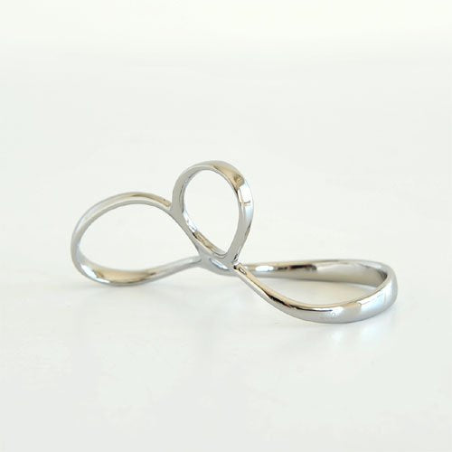 Alessi PG01 Voile silver spaghetti measure in a sleek, modern design for kitchen storage and organization.