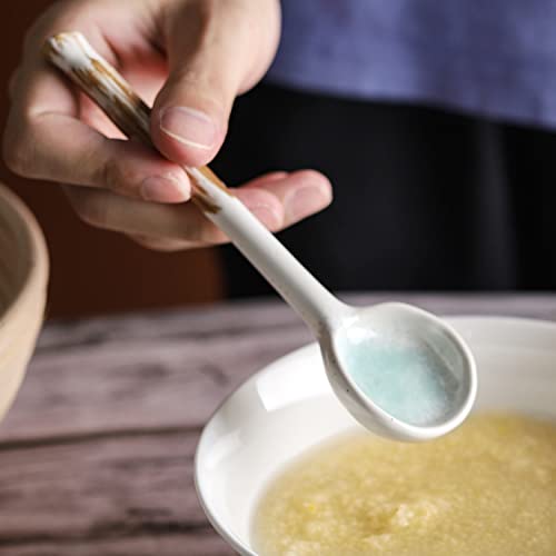 Set of 4 Evannt Japanese ceramic ramen soup spoons with traditional Asian style, featuring smooth white finish and rounded handles.