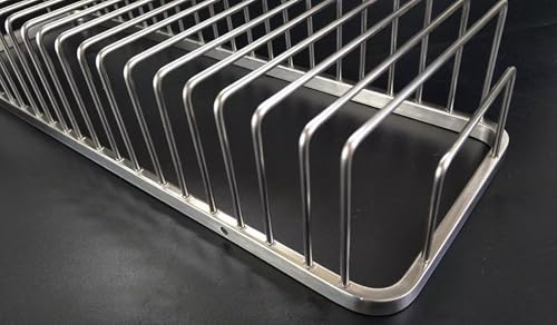 Nokozan stainless steel rectangular shower caddy holding shampoo and body wash bottles in a bathroom.