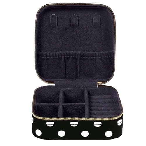 Kate Spade New York polka dot travel jewelry case with multiple compartments and a compact, stylish design for jewelry storage.