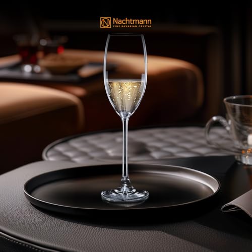 Set of Nachtmann Vivenci champagne flutes by Spiegelau, clear glass drinkware for celebrating occasions.