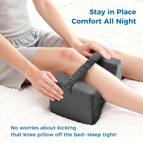 Grey memory foam knee pillow with strap by ComfyInLove, designed for side sleepers to improve leg and hip alignment.