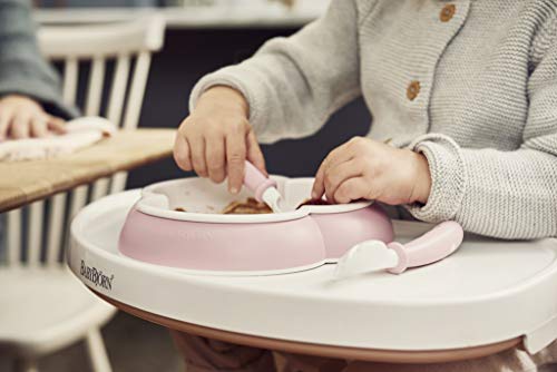 BabyBjörn Baby Feeding Set in powder pink, 4-piece flatware set for babies, includes fork, spoon, and utensils on a white background.