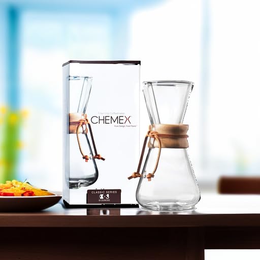 Chemex Classic Series 3-cup pour-over glass coffeemaker with wooden collar and leather tie, designed for brewing coffee.