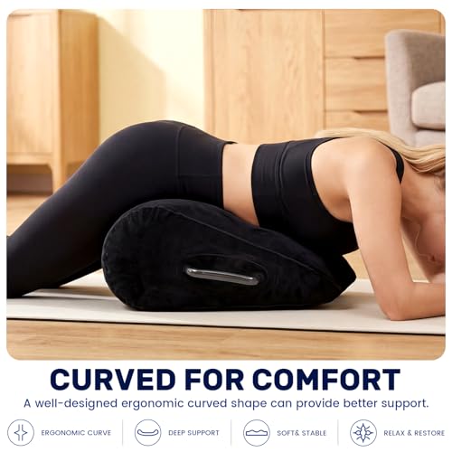 Black inflatable velvet wedge pillow with dual handles from Jamntower, designed for body positioning and comfort.