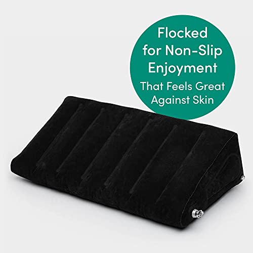 Black Lovehoney Dominix inflatable sex position wedge for couples, used for enhanced intimacy and comfortable positioning.