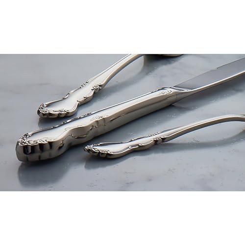 Set of four Oneida Dover dinner forks with polished silver finish, part of a silverware set for elegant dining.
