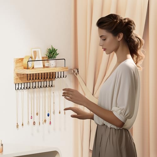 Black Lolalet wall necklace holder and jewelry organizer with hooks for hanging necklaces and jewelry.