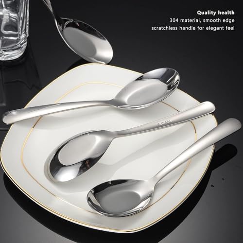 Set of 12 stainless steel soup spoons with long handles, ideal for serving and dining in a modern kitchen.