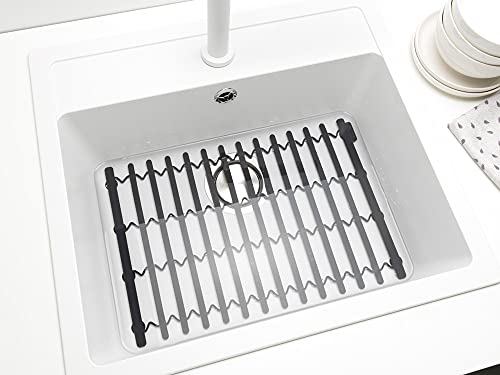 Brabantia extendable dark gray silicone dish drying rack with drainage tray, heat resistant for drying dishes and utensils.