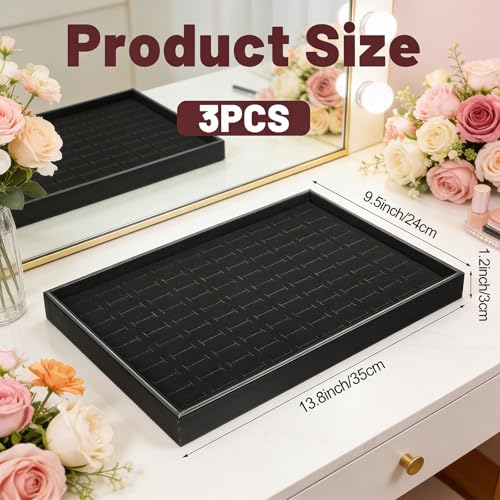 Three stackable velvet jewelry trays with 300 slots for rings, perfect for organizing and displaying jewelry accessories.