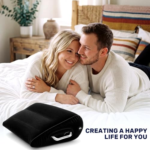 Black inflatable velvet wedge pillow with dual handles, designed for body positioning and support by Jamntower.