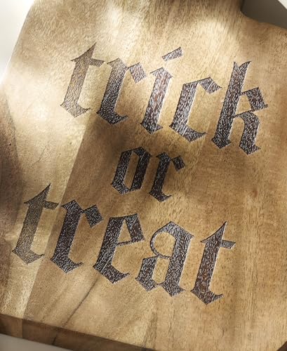 Oneida Vintro Halloween Trick or Treat cheese board with cheese servers and festive Halloween design for serving snacks and cheeses.