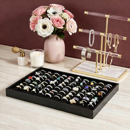 Three stackable velvet jewelry trays with 300 slots for rings, by PercyEffie, displaying organized ring storage.