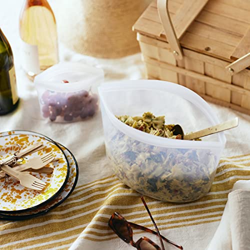 Clear Stasher reusable silicone food storage bowl with 8-cup capacity, leak-free design, ideal for storing snacks and leftovers.