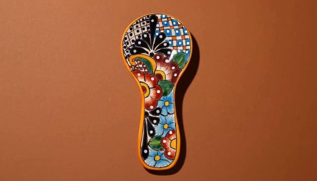 Mexican Talavera ceramic spoon rest in multicolor with intricate patterns by Casa Fiesta Designs for kitchen use.