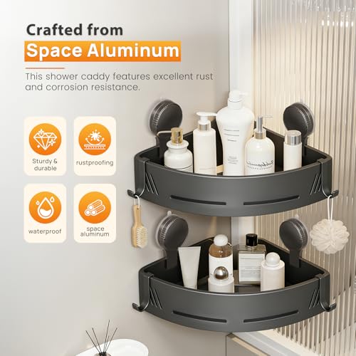 Two grey triangular corner shower caddies with suction cups and hooks by PHX Grove, designed for bathroom organization.