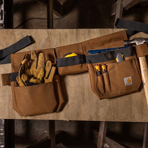Carhartt brown adjustable utility tool belt with multiple pockets and durable construction