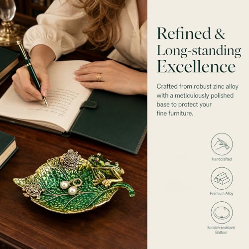 Hand-painted enamel leaf-shaped jewelry dish featuring a frog and turtle design, ideal for rings and small accessories.