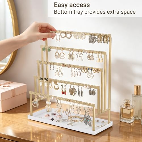 Gold Mkono 5-tier jewelry tower with earring holder and tray for organizing earrings and jewelry displays.