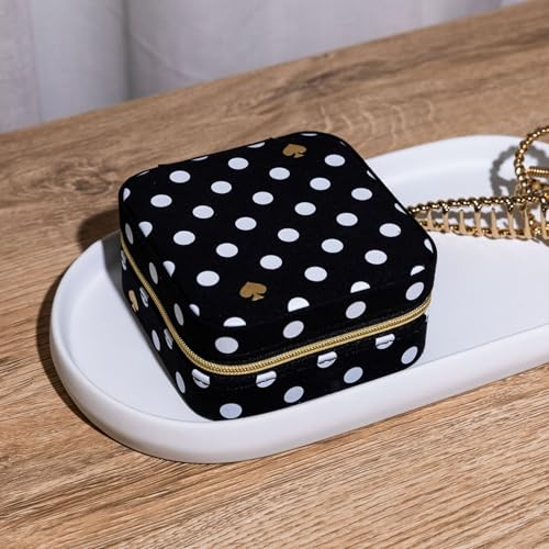 Kate Spade New York polka dot travel jewelry case with compartments for jewelry storage and organization.