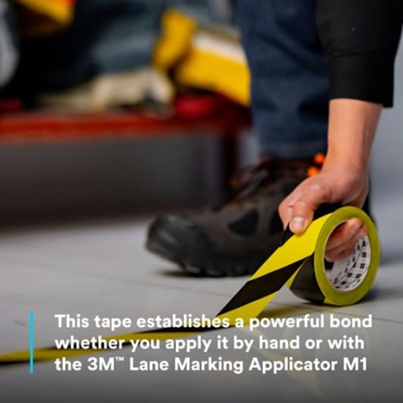 3M Hazard Warning Tape 766, 2 Inch x 36 Yards, Black and Yellow Striped Vinyl Safety Tape, High-Visibility Adhesive Floor Marking Roll for Warehouse, Aisle, Stair, Equipment, and Hazard Zones