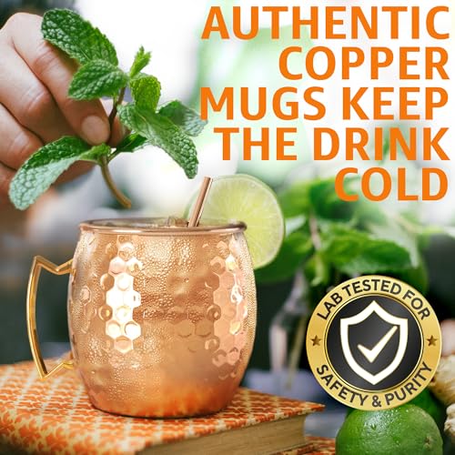 Two 16 oz Benicci Moscow Mule copper mugs with handles, made of pure solid copper, displayed with a reflective surface.
