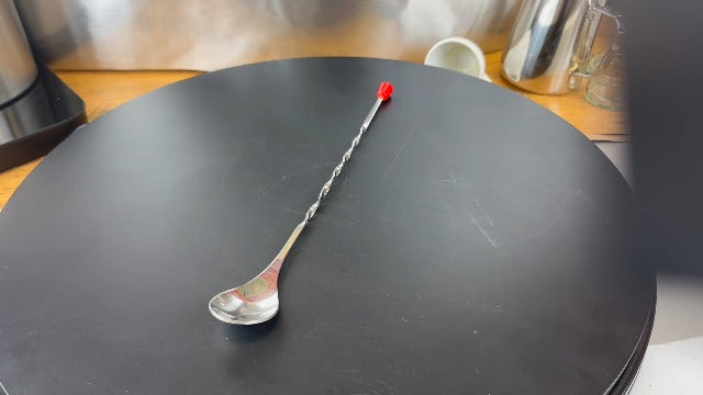 Pair of Rattleware stainless steel 11-inch twist bar spoons for mixing cocktails and iced tea in a 24-pack.
