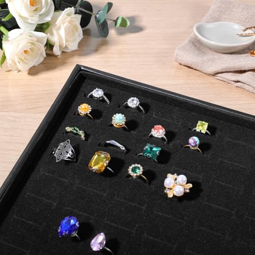 Three stackable PercyEffie velvet jewelry trays with 300 slots for rings, featuring a sleek display board and case for organizing jewelry.