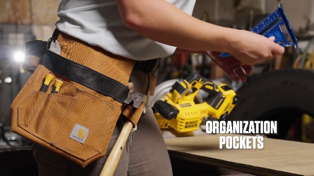 Carhartt brown adjustable utility tool belt with multiple pockets and durable webbing