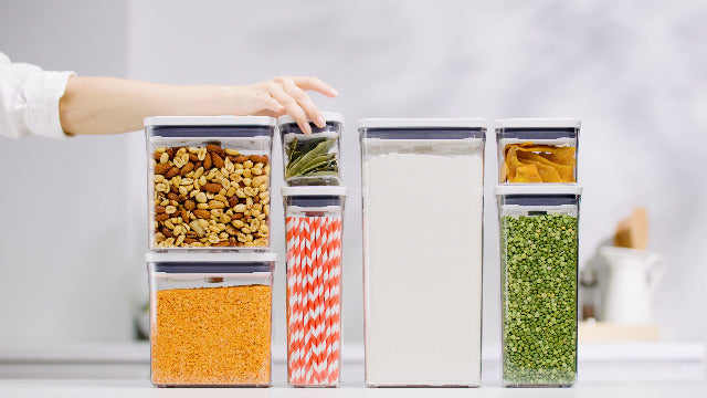 OXO Good Grips 3.7 Qt rectangle clear food storage container with a secure lid for kitchen organization.