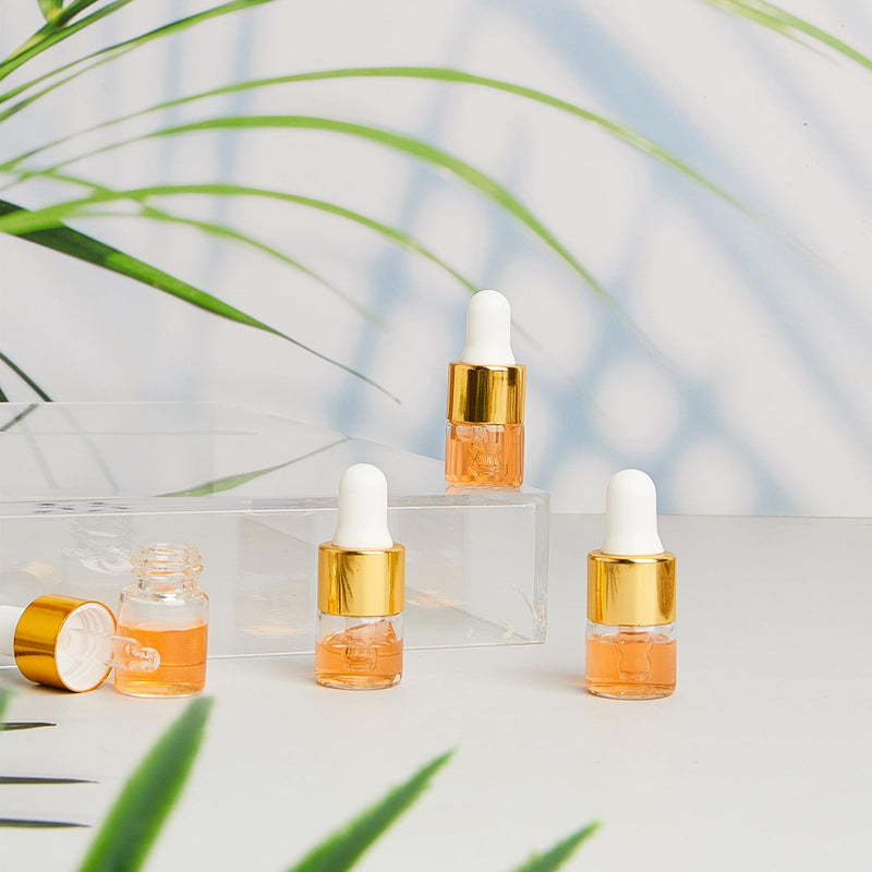 [Australia - AusPower] - 100 Pcs Mini Glass Dropper Bottle Bulk Clear Essential Oil Dropper Bottles Small Glass Dropping Sample Containers Perfume Liquid Cosmetic Sample Vials with Cap for Traveling (Gold,1 ml) Gold 1 ml 