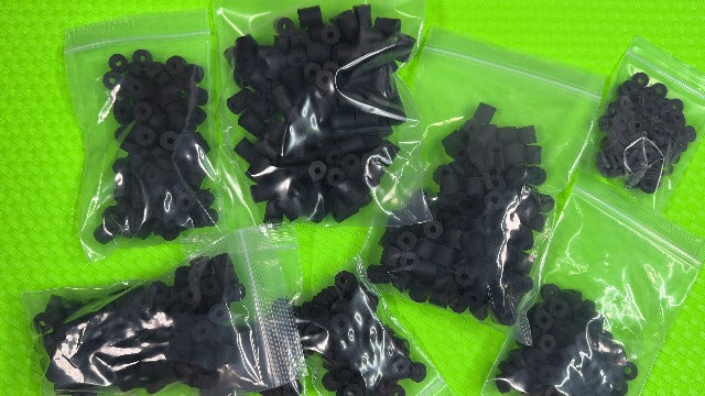 Black Holstex EPDM rubber holster washers, .500 x .180 x .625, 100-pack flat washers for mounting posts and Kydex retention
