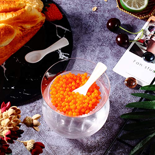 Patelai glass caviar serving set with four stainless steel caviar spoons and a chilled dish for elegant caviar presentation.