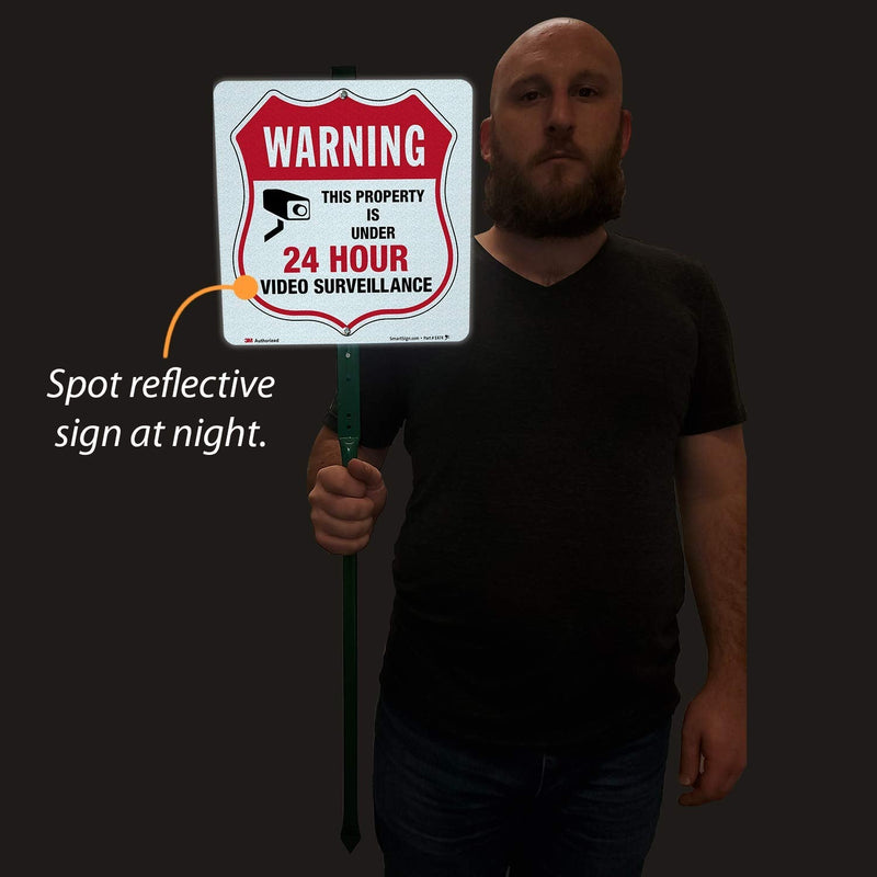 SmartSign 10" x 10" 'Warning - This Property Is Under 24 Hour Video Surveillance' Yard Sign with 3 ft Stake, 40 mil Aluminum 3M Laminated Engineer Grade Reflective, Red/Black/White 10" x 10" Reflective Aluminum Sign with 3' Stake