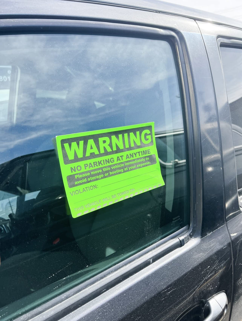InStockLabels.com Warning No Parking at Anytime Stickers – Bright Green Warning Stickers for Unauthorized Vehicle for Towing & Booting Parking – 100 Labels per Roll