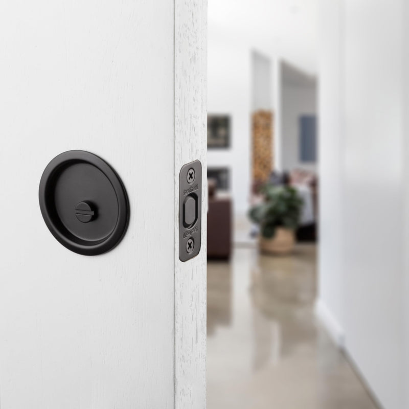 Kwikset Pocket Door Deadbolt Lock, Matte Black Round Exterior UnKeyed Closet Pantry Pull Door, with Microban Protection Privacy