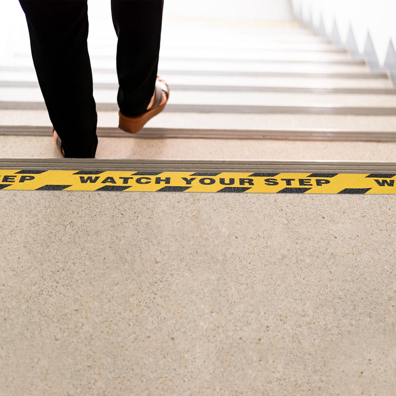 M METERXITY 1 Pcs WATCH YOUR STEP Floor Decals Stickers 2 x 197 Inch Watch Your Step Sign Warning Sticker Self-Adhesive Anti Slip Abrasive Tape for Indoor/Outdoor Stairs Step[Yellow Black]