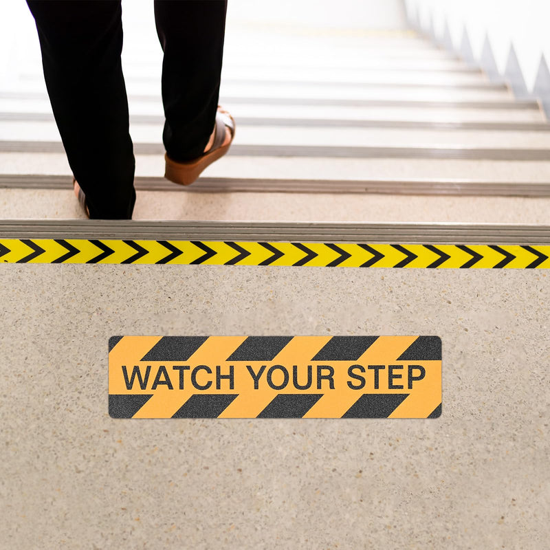 M METERXITY 2-Pack WATCH YOUR STEP Floor Decals Stickers 6 x 24 Inch Watch Your Step Sign Warning Sticker Self-Adhesive Anti Slip Abrasive Tape for Indoor/Outdoor Stairs Step[Yellow Black]