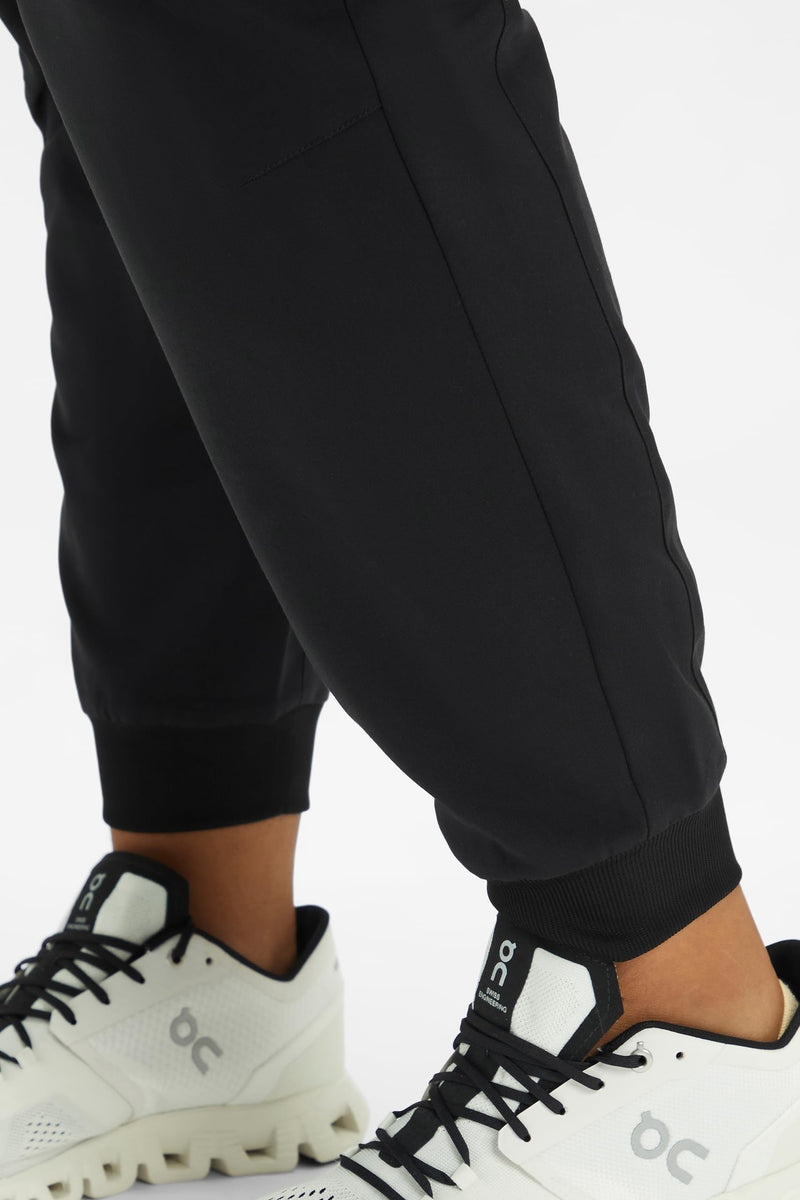 [Australia - AusPower] - Fabletics Women's Active Scrub Jogger - MotionTech, Pocket-Packed, Lightweight, Wrinkle-Resist, Semi-Slim Fit Regular Large Black 