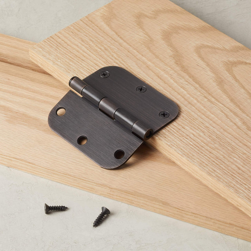 Amazon Basics Rounded 5/8 Radius Interior Door Hinges with Screws, 3.5" x 3.5", Oil Rubbed Bronze, 36-Pack 36 Pack ברונזה משוחה בשמן