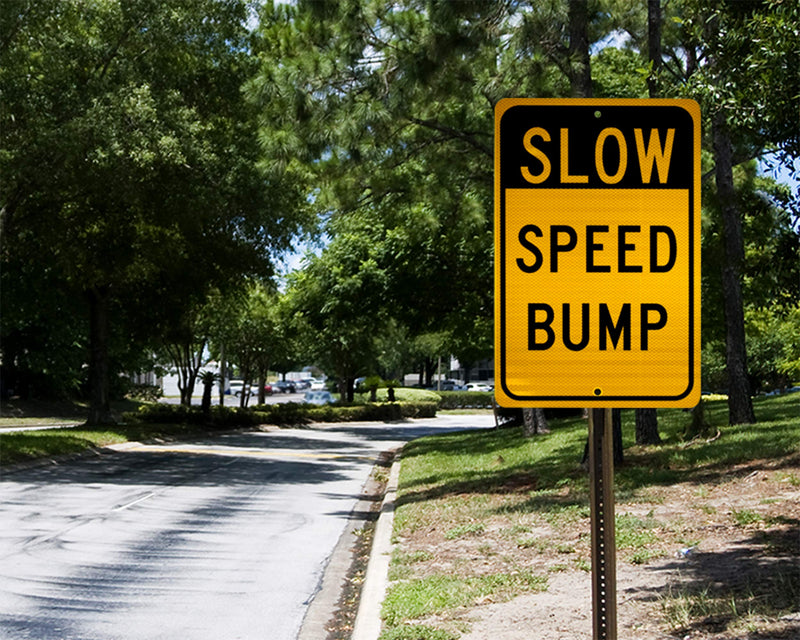 NMC TM157J Traffic Sign, Legend "SLOW - SPEED BUMP", 12" Length x 18" Height, Engineer Grade Prismatic Reflective Aluminum 0.080, Black On Yellow