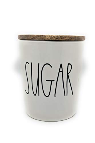 Rae Dunn by Magenta large ceramic cellar canisters with wood lids, labeled "SUGAR" for kitchen storage.