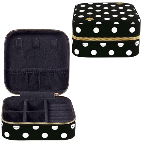 Kate Spade New York travel jewelry case with polka dot design, compact jewelry storage box with compartments for necklaces and rings.